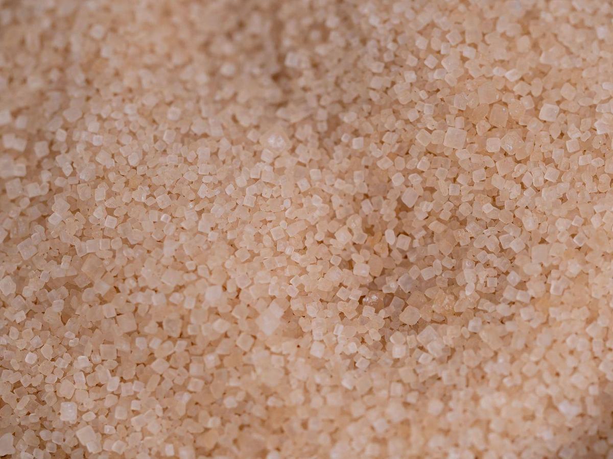 Raw cane sugar crystals